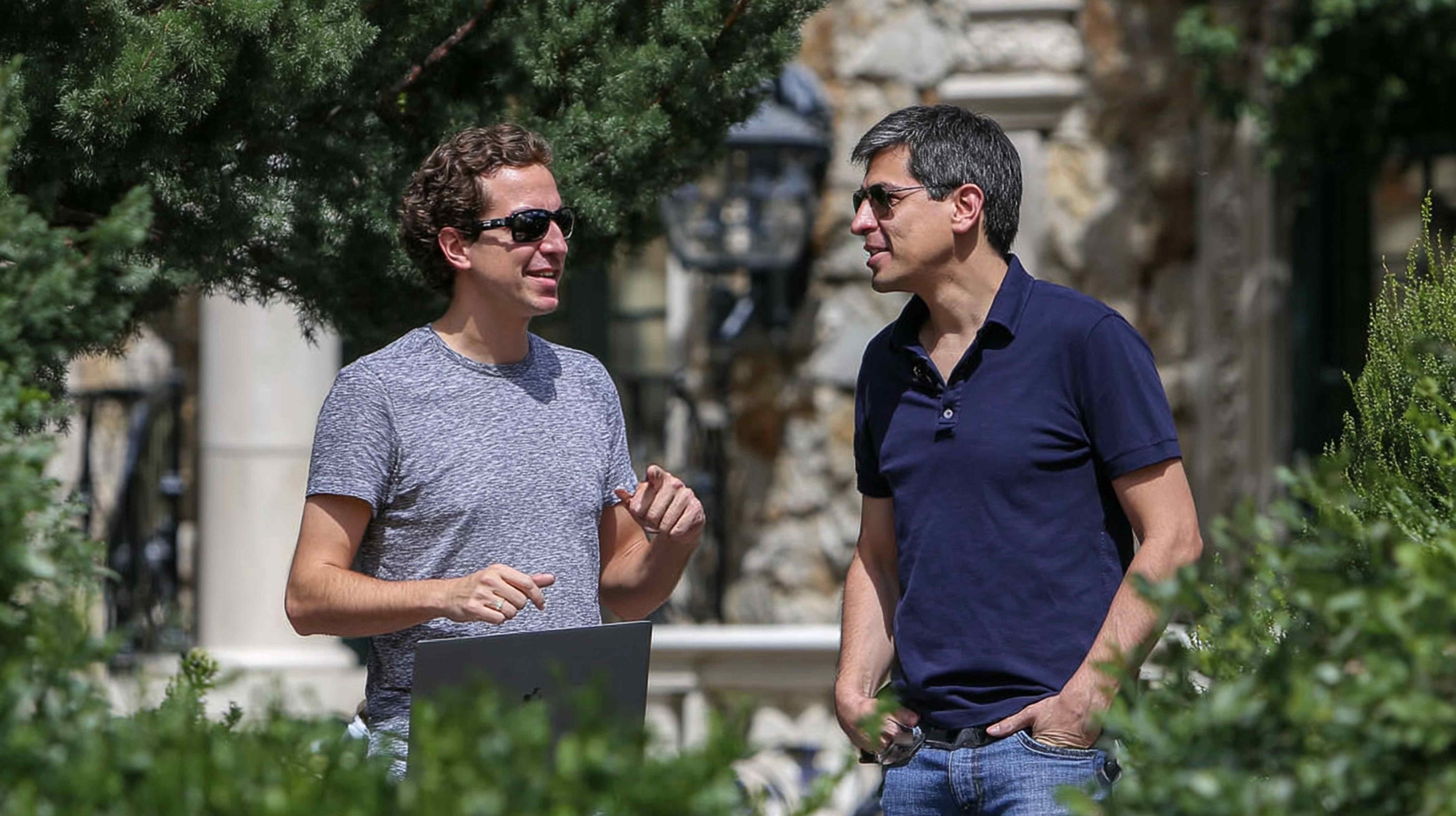 Informal business discussions with laptop